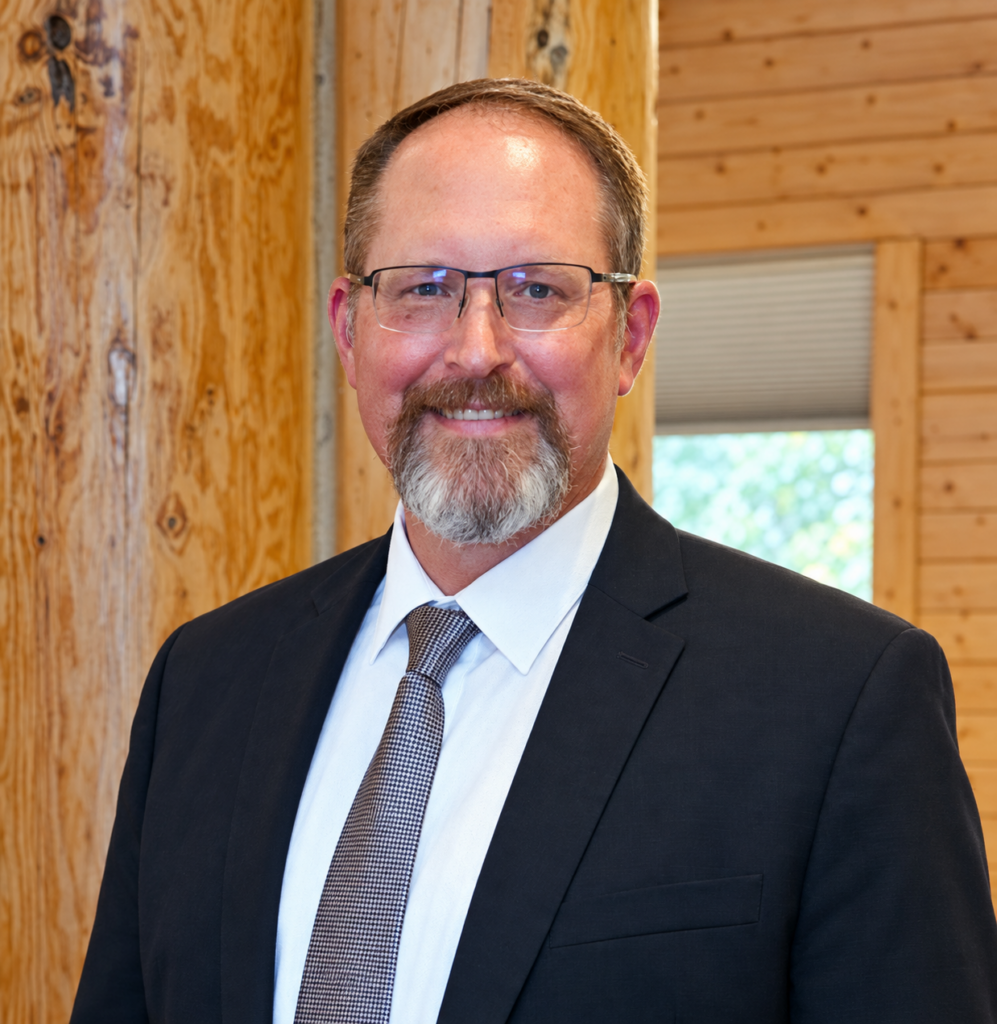Leadership portrait in a warm wooden interior